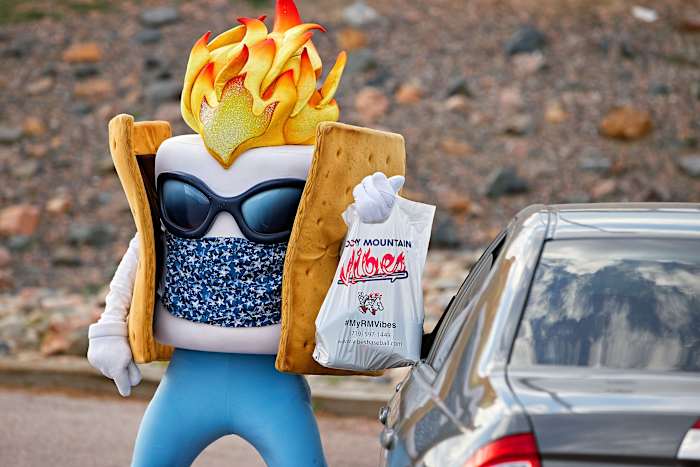 The Vibes’ mascot, Toasty, delivered curbside takeout to cars outside the club’s Colorado Springs stadium.